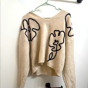 Lumiere Cream and Black V-Neck Sweater Artistic Design